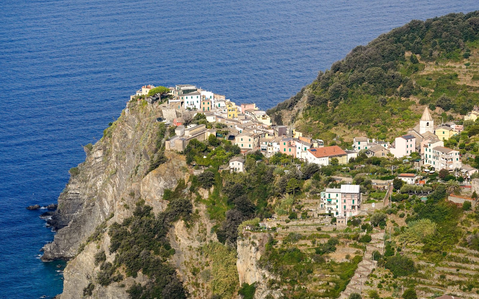 The village of Corniglia in the Cinque Terre, perched on a terraced headland above the Ligurian Sea