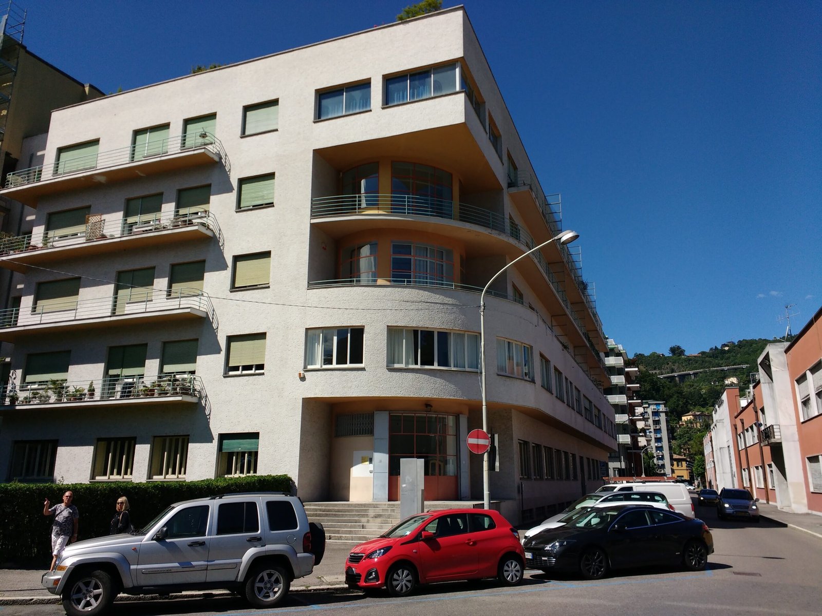 The Novocomum apartment building in Como, with its cylindrical glazed corner wrapping the angle of the block