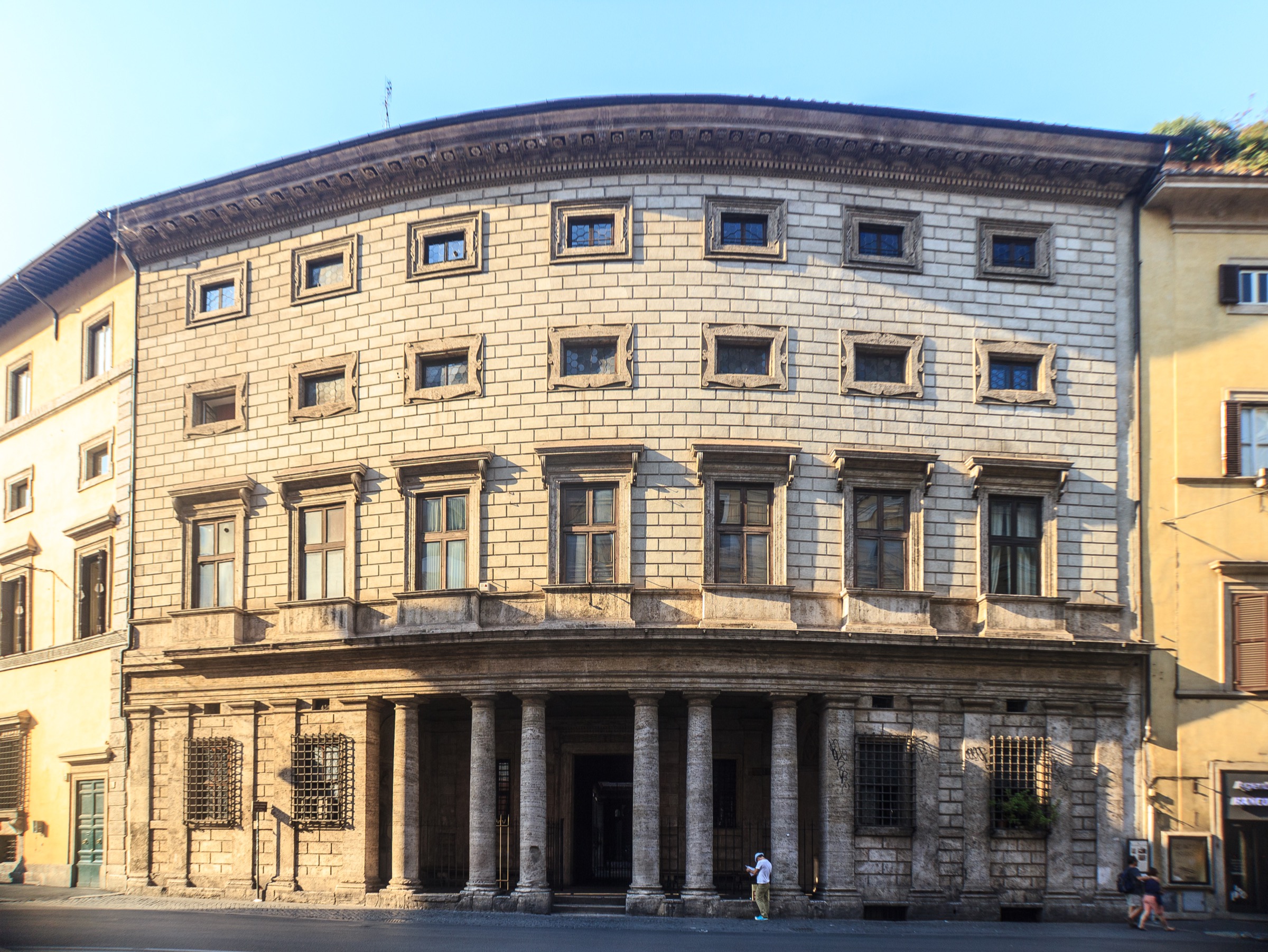 Concave façade of Palazzo Massimo alle Colonne on Corso Vittorio Emanuele II, Rome, with the six-column Doric portico at street level