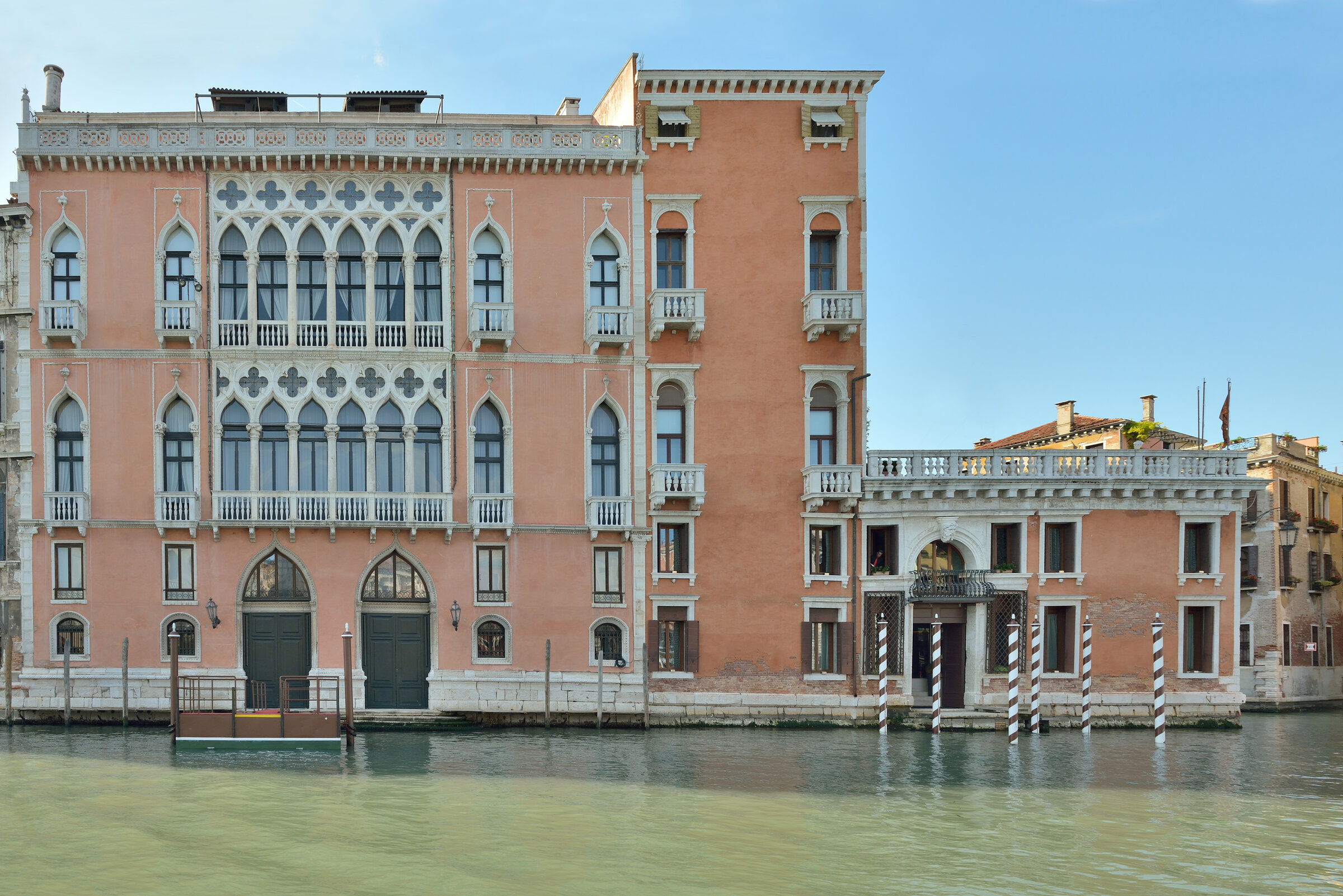 Façade of Palazzo Pisani Moretta on the Grand Canal in Venice, with two superimposed Gothic hexafora windows