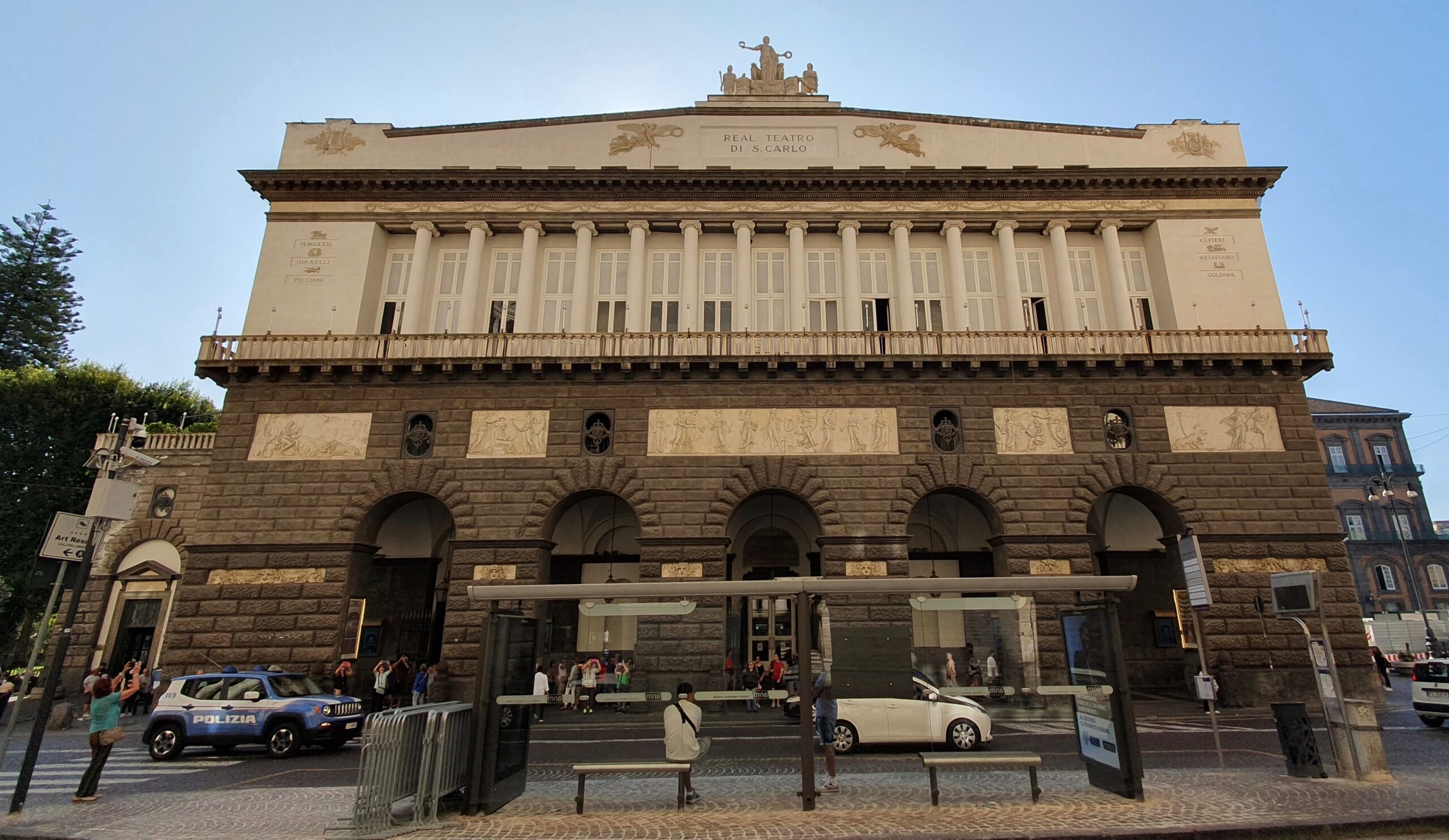 Neoclassical facade of the Teatro di San Carlo on Via San Carlo, Naples