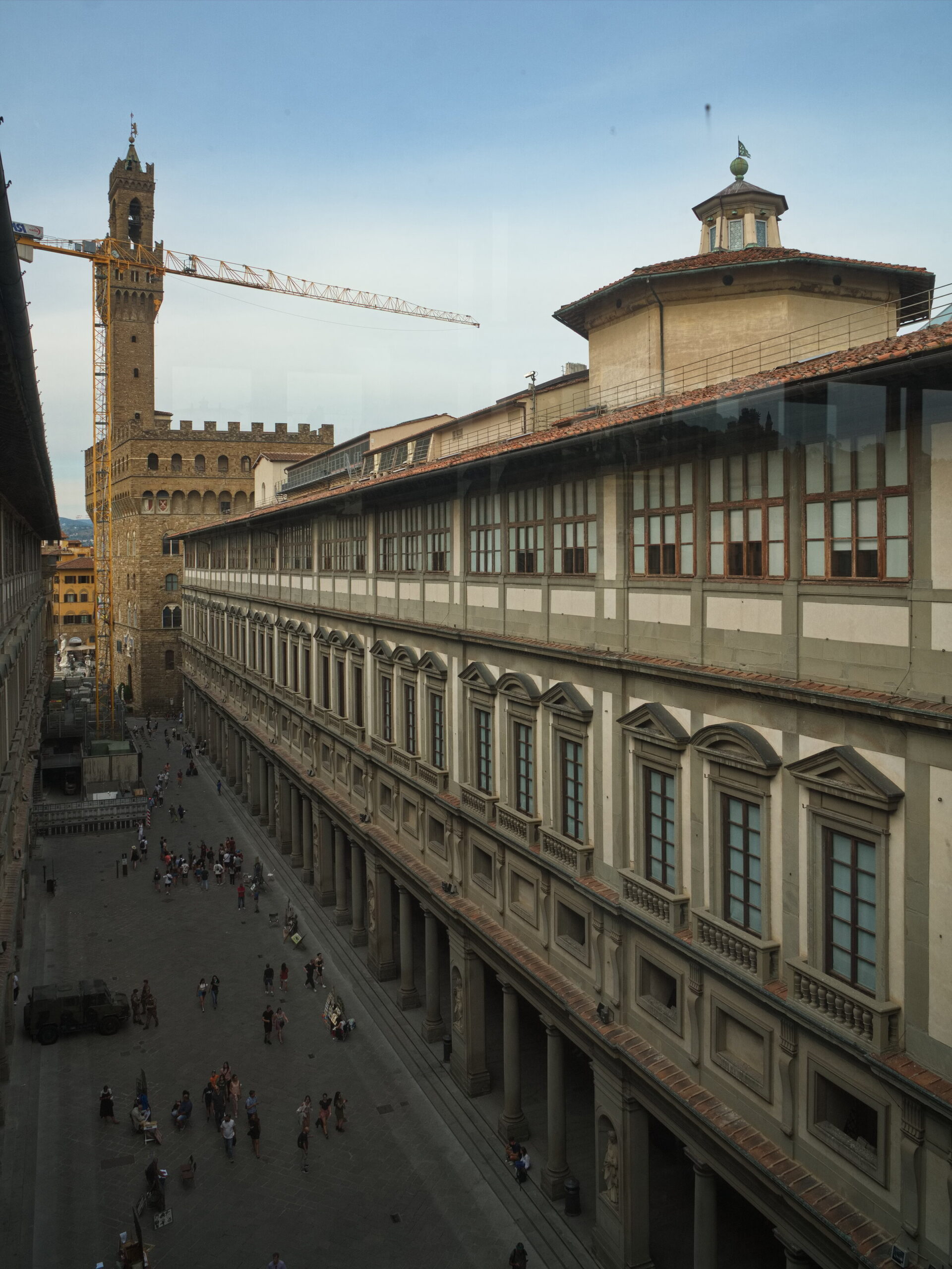 The Uffizi courtyard seen from Piazzale degli Uffizi, east wing with the tribune and the tower of Palazzo Vecchio in the background