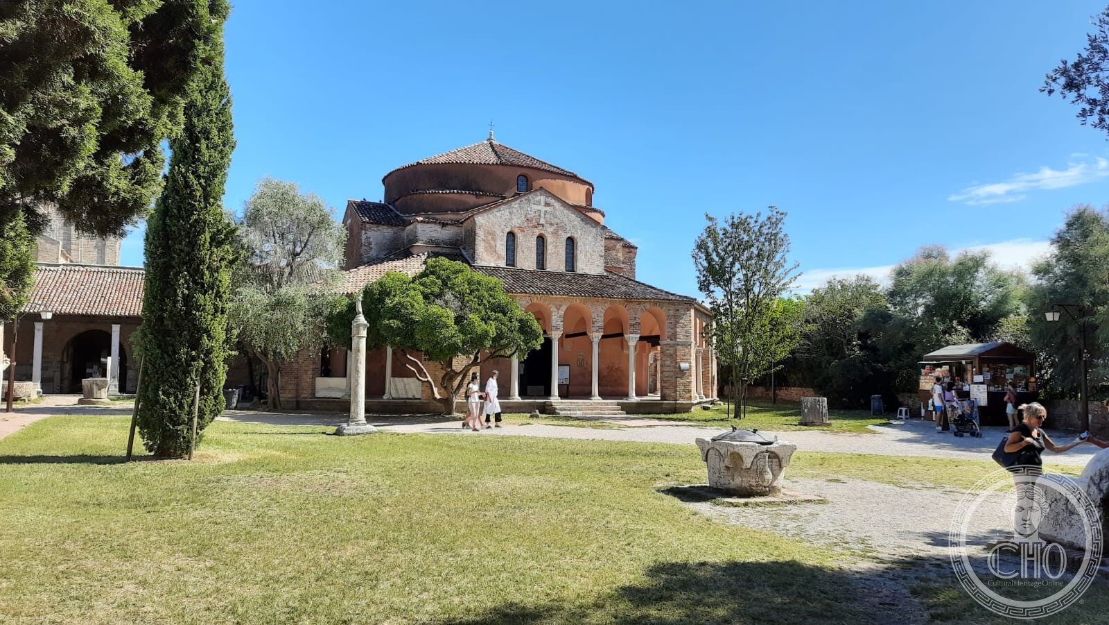 The Basilica di Santa Maria Assunta at Torcello with an old well in the foreground