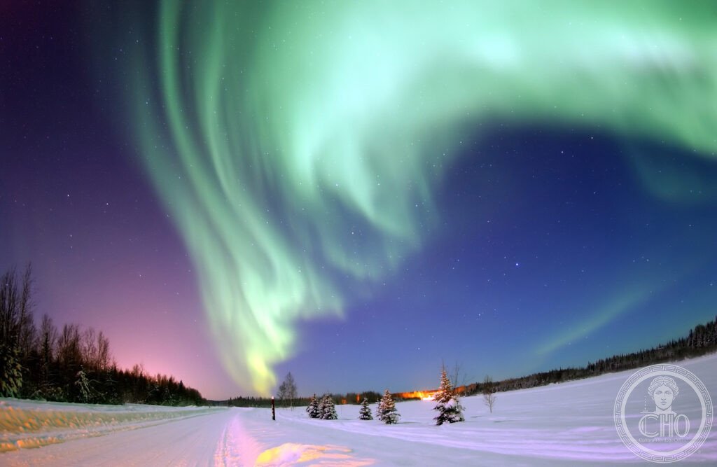 Aurora borealis northern lights Iceland green sky winter Thingvellir landscape