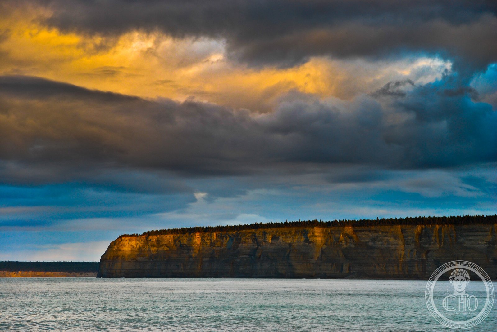 Rocky coastline of Baie de la Tour on Anticosti Island, Quebec, Canada — the limestone cliffs expose 450-million-year-old Ordovician and Silurian fossil beds, one of the world's most complete records of ancient marine life