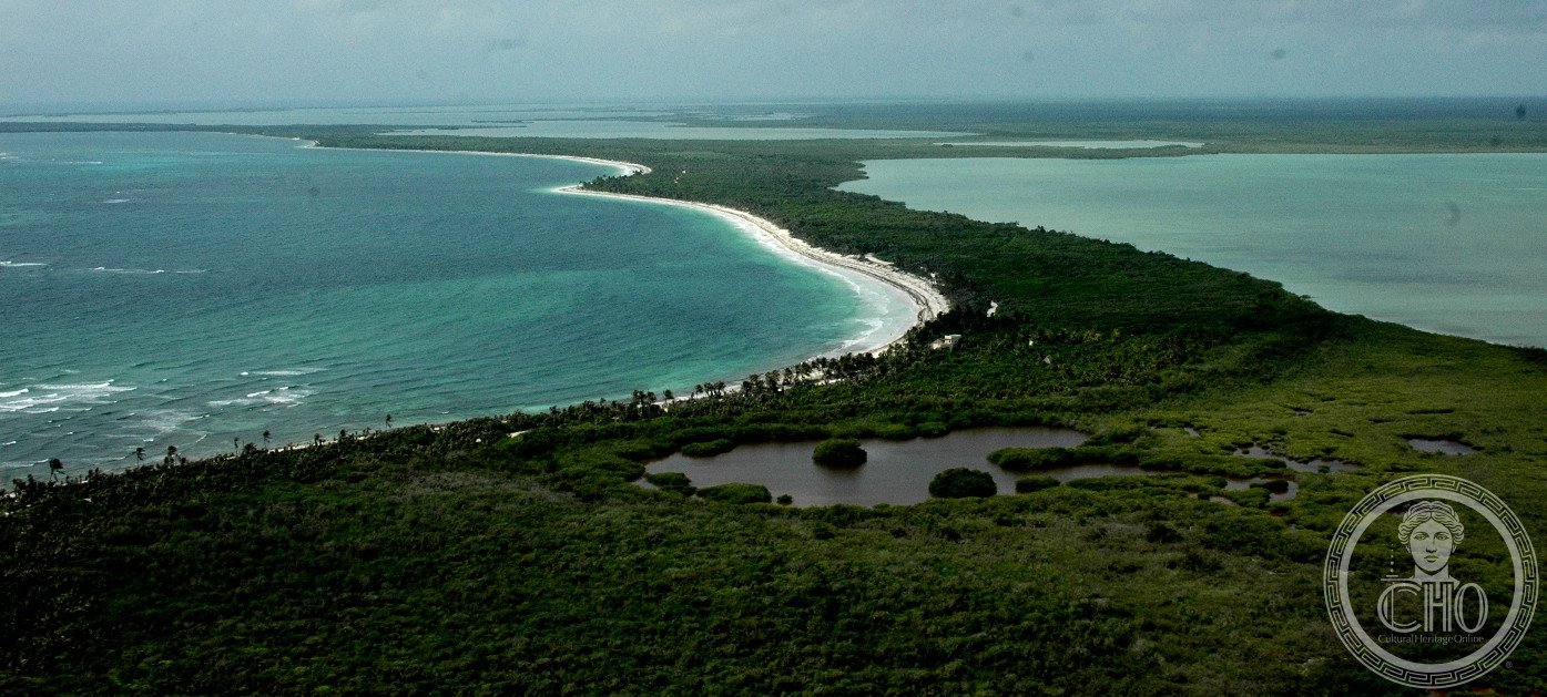 Coastal wetlands and lagoon channels of Sian Ka'an Biosphere Reserve on the Caribbean coast of Quintana Roo, Mexico — mangroves, turquoise water and distant horizon