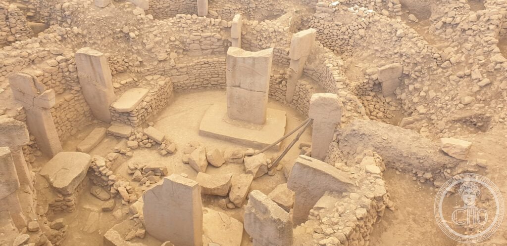 Göbekli Tepe Neolithic megalithic enclosure T-shaped pillars carved animals Turkey UNESCO