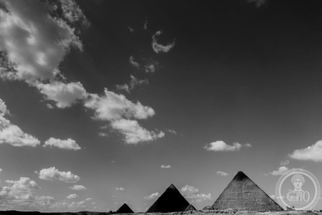 Pyramids of Giza three great pyramids Khufu Khafre Menkaure Sphinx desert plateau Egypt