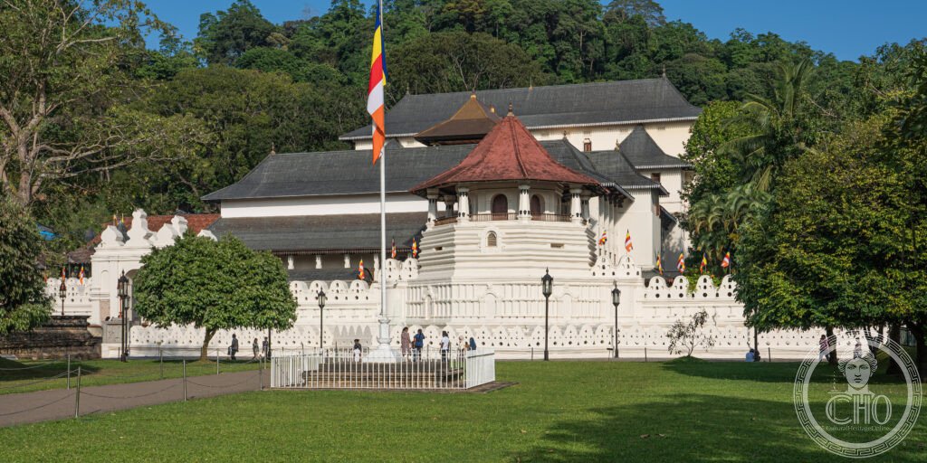 Temple of the Tooth Relic Dalada Maligawa Kandy Sri Lanka lakeside Kandy Lake moat gilded roof Buddhist sacred city UNESCO World Heritage