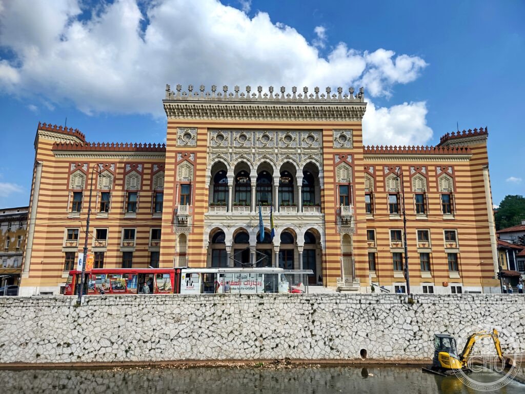 Vijećnica Sarajevo City Hall Moorish Revival facade on Miljacka riverbank