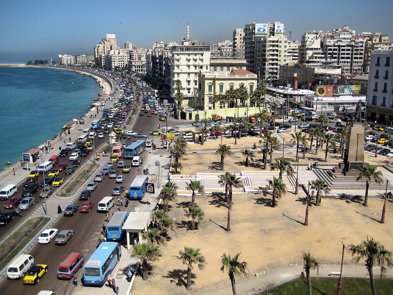 Alexandria Corniche curving past Saad Zaghloul Square with historic waterfront facades