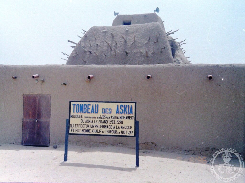 The stepped pyramidal mud tomb of Askia, bristling with wooden beams, at Gao in Mali