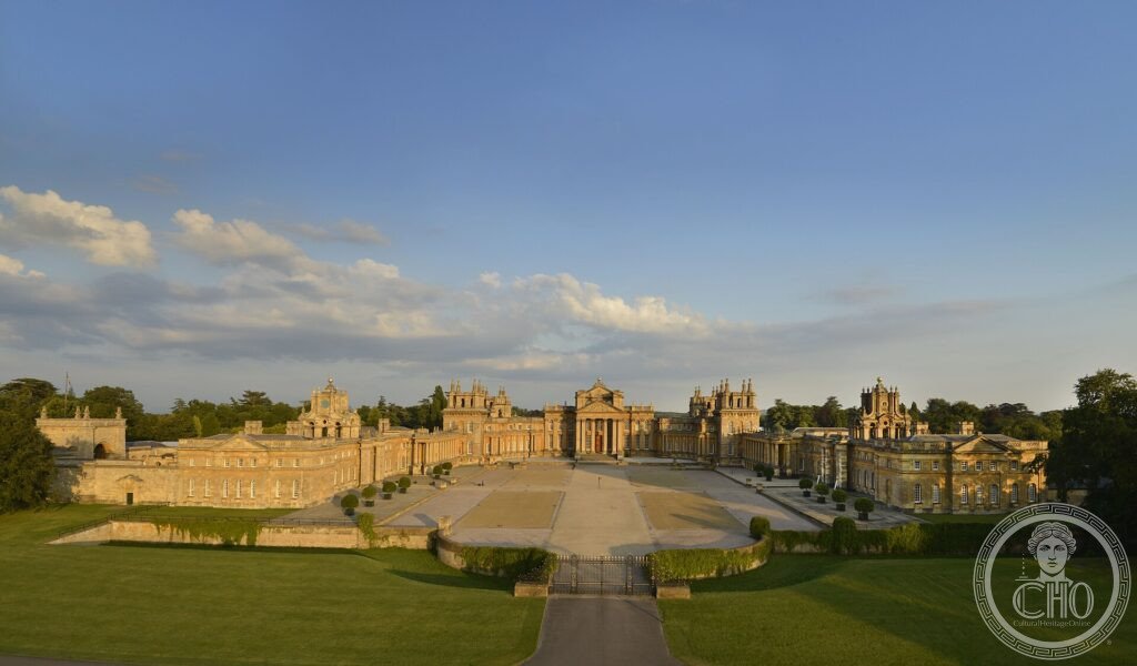 The Baroque façade and great court of Blenheim Palace in Oxfordshire at golden hour