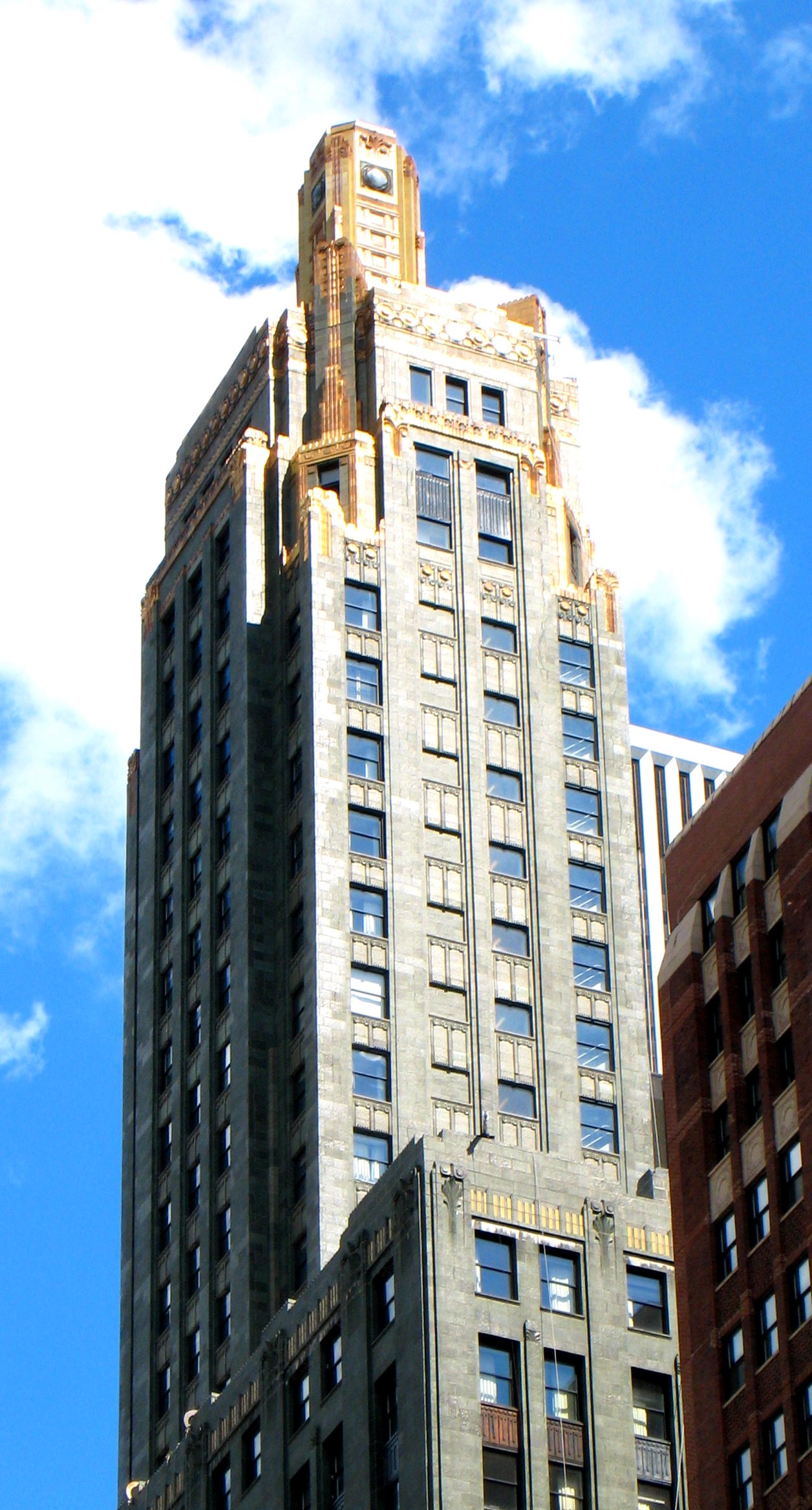 Dark green and gold Art Deco tower of the Carbide and Carbon Building on Michigan Avenue, Chicago