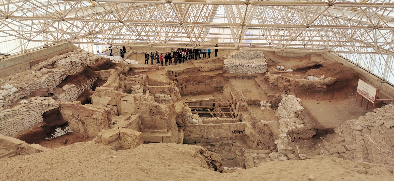 Aerial view of Çatalhöyük excavation mound showing densely packed mud-brick house remains in southern Turkey