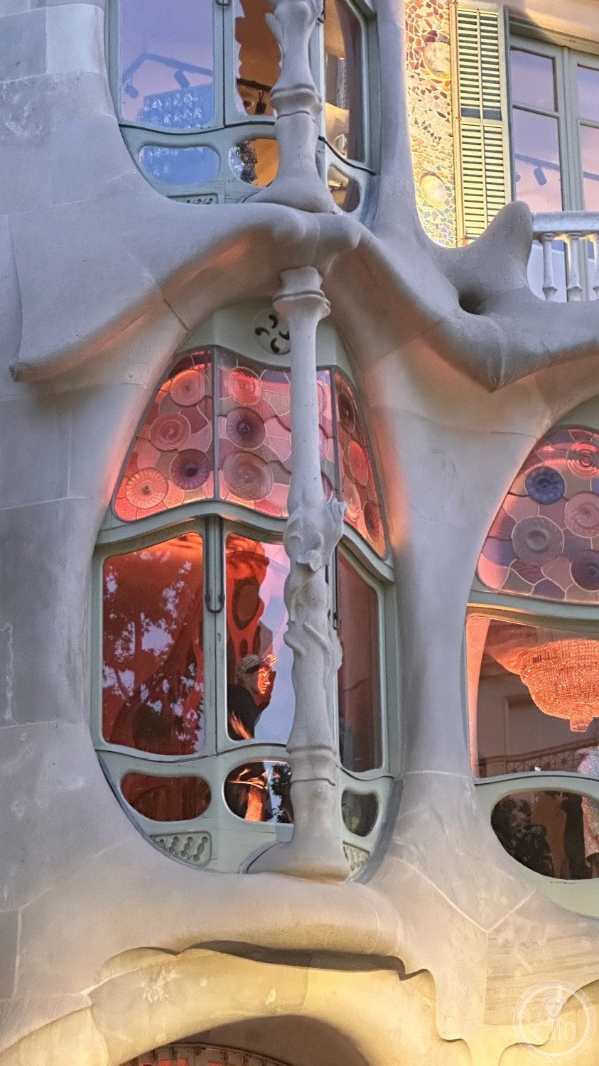 Casa Batlló — Coloured glass and the modelled stone of the windows.