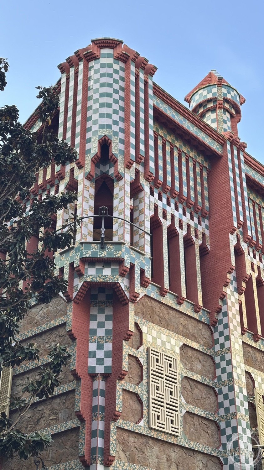 Casa Vicens — The towers and projecting eaves seen from the street corner.