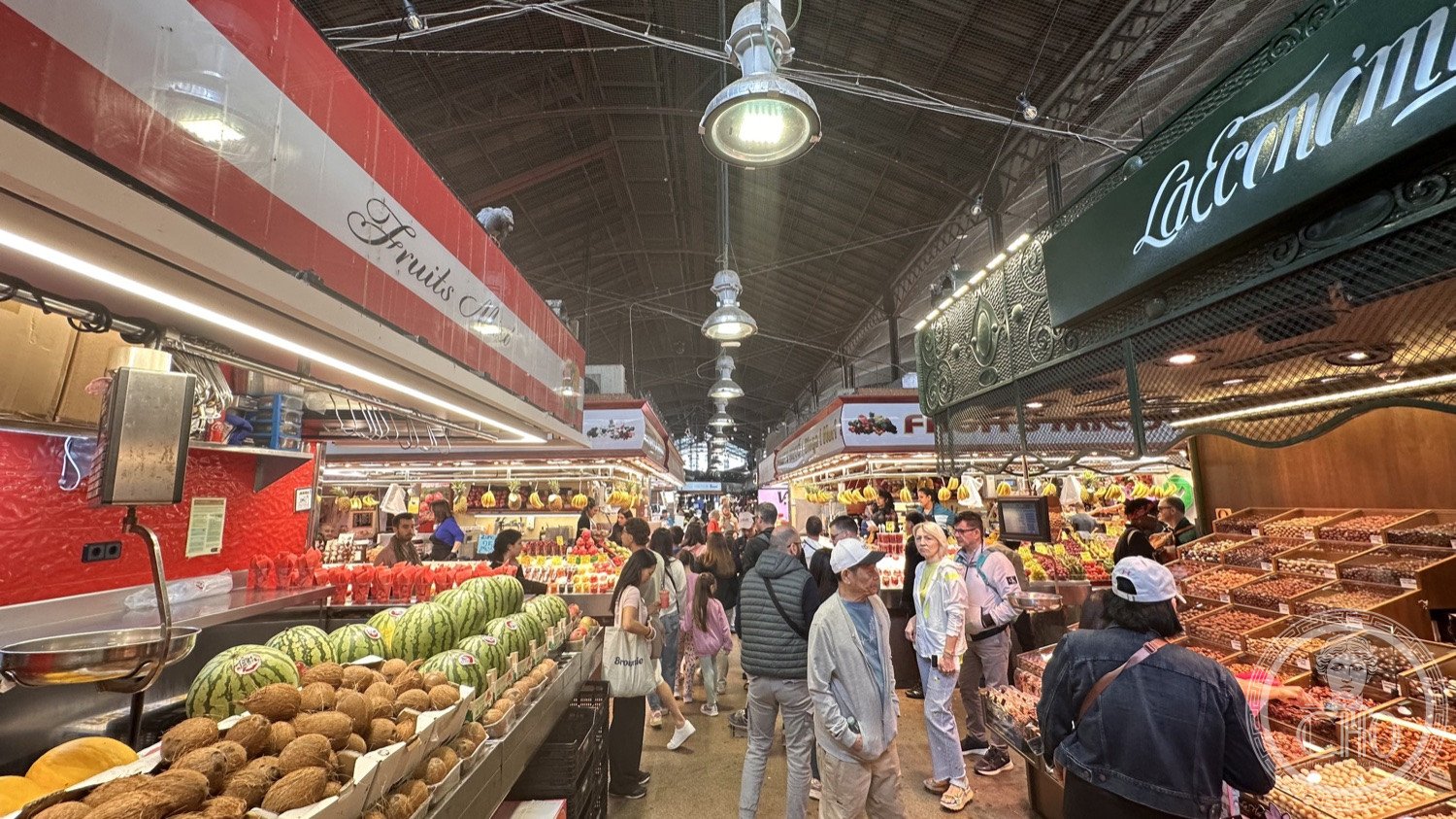 La Boqueria — The market aisles under the iron-and-glass roof.