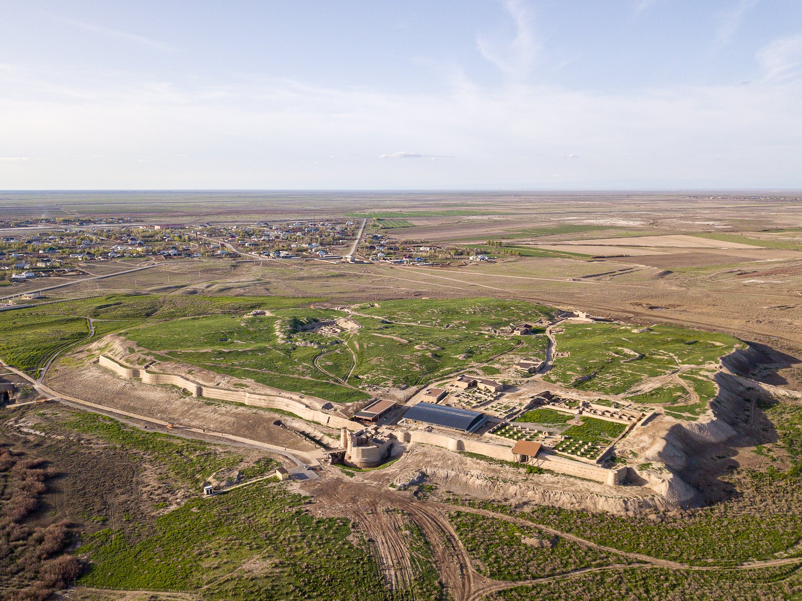 Aerial view of the Otrar citadel mound rising from the steppe at the confluence of the Arys and Syr Darya rivers, southern Kazakhstan