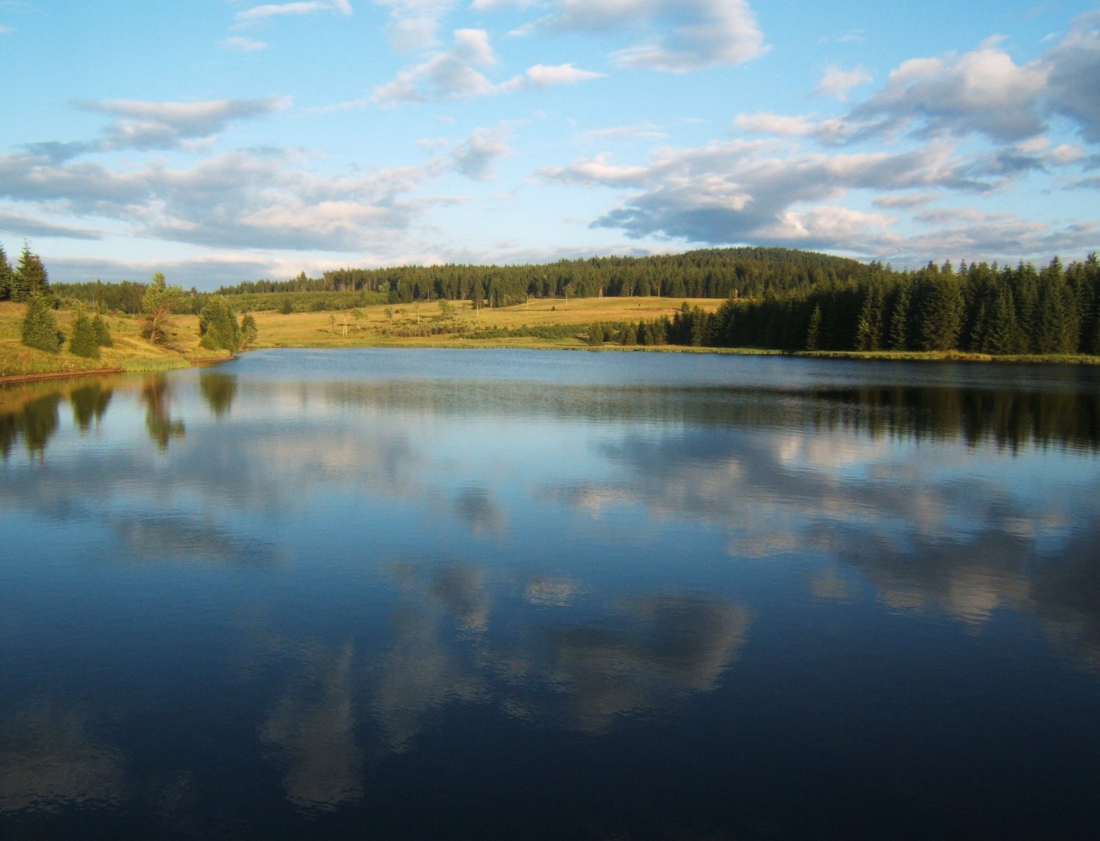 Lake in the Erzgebirge Ore Mountains landscape, Saxony-Czech border