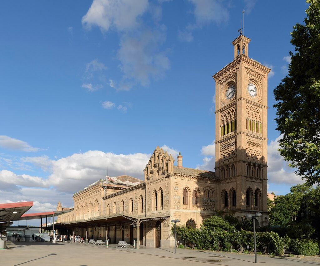 The neo-Mudéjar brick-and-tile façade and tower of the Toledo railway station The neo-Mudéjar brick-and-tile façade and tower of the Toledo railway station