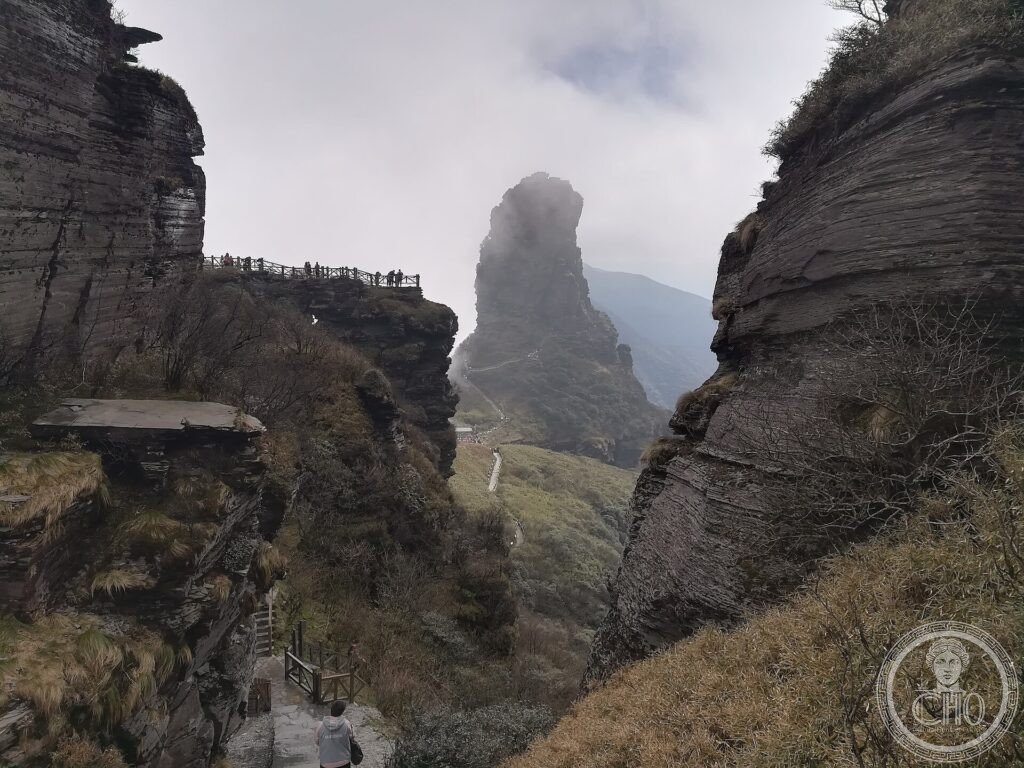 The Red Cloud Golden Summit pinnacle of Mount Fanjing rising from cloud, with stairways
