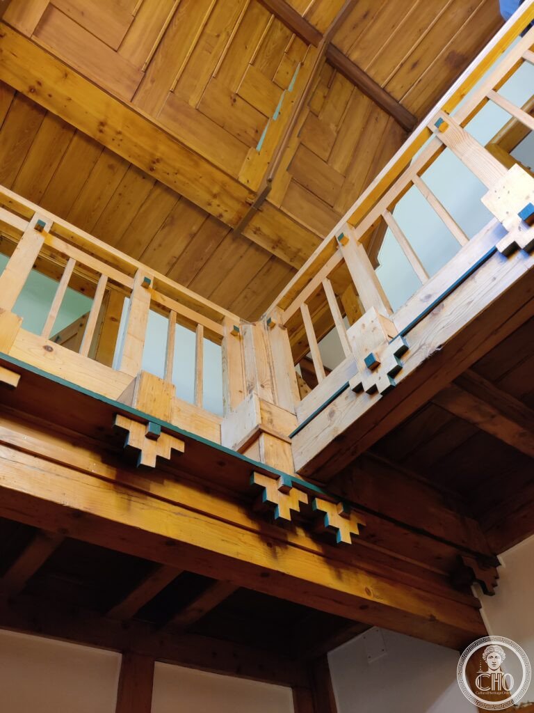 Interior view of the entry area to Villa Fallet, looking up from the ground floor