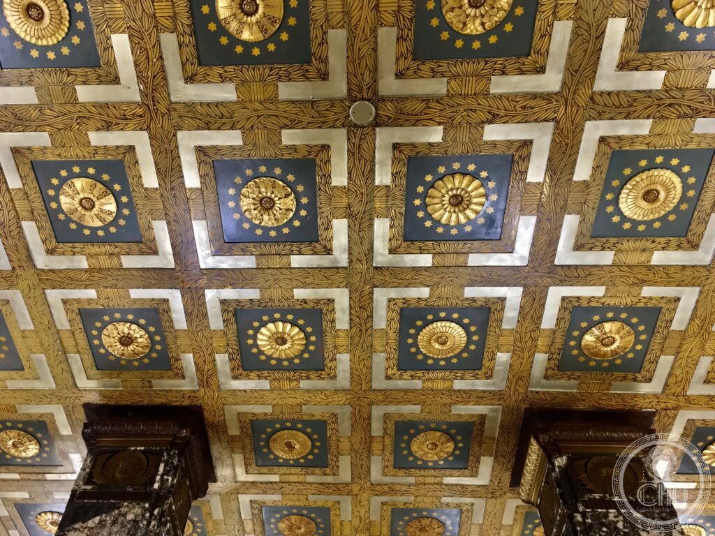 As seen in December 2020. A view of the ornately decorated ceiling just inward from the main entranc