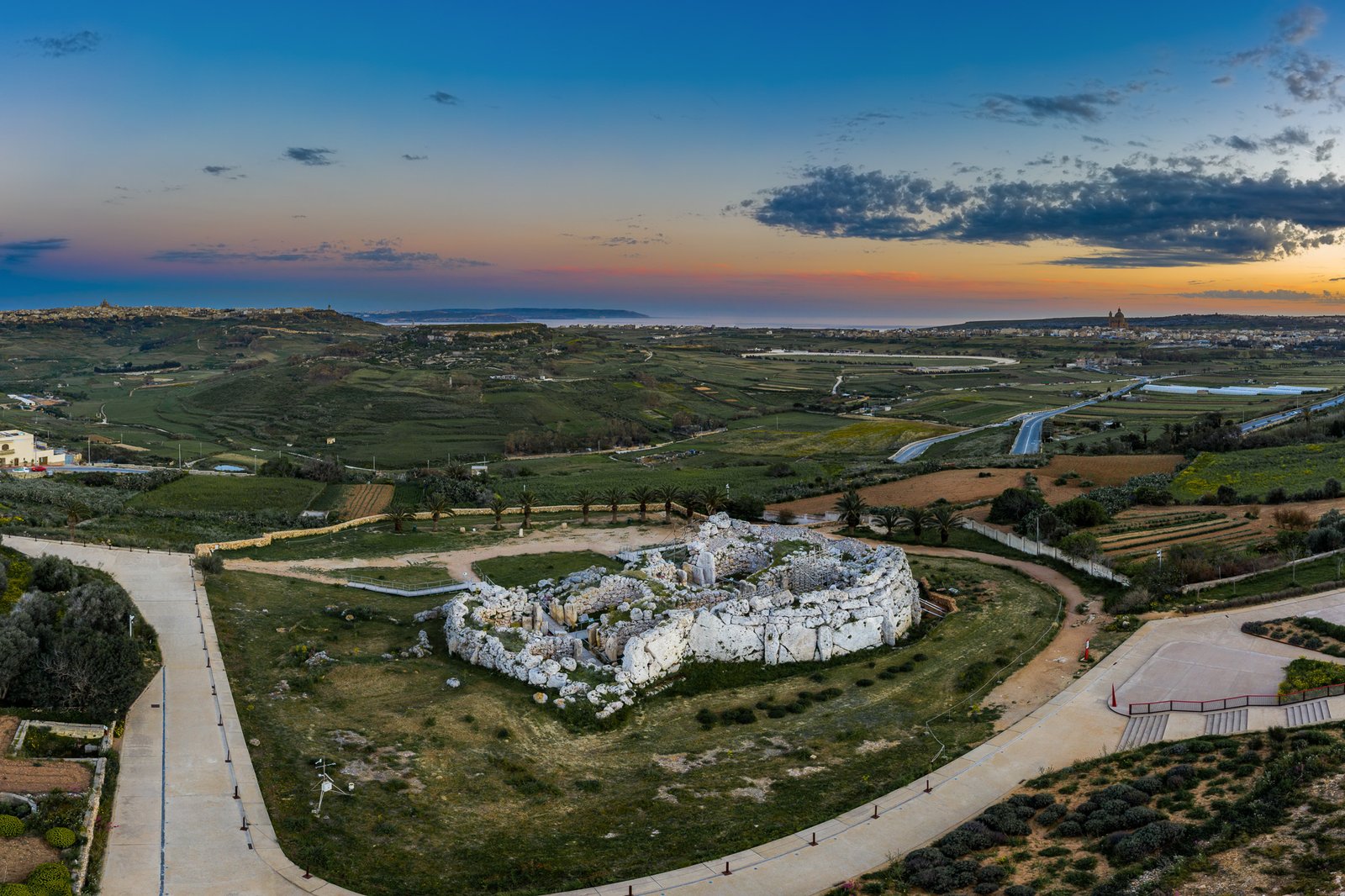 Massive coralline limestone walls of the Ġgantija Temples rising six metres on Gozo, Malta