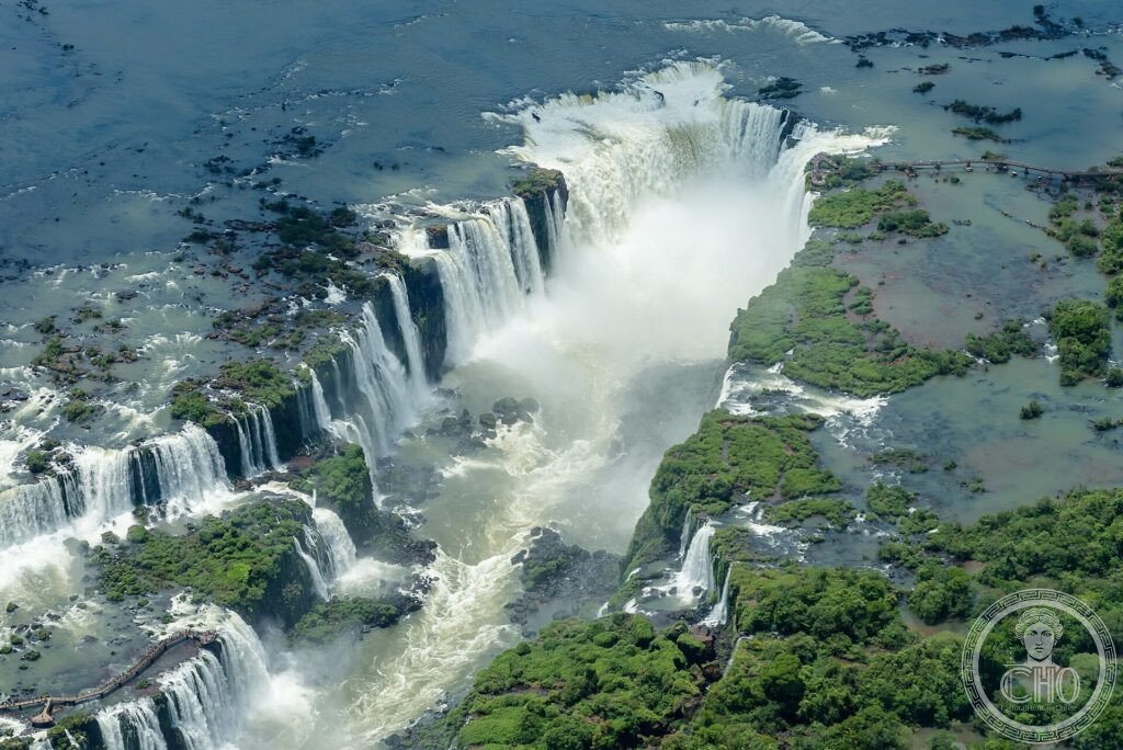 Aerial view of the Devil's Throat and the chain of Iguaçu Falls amid green forest