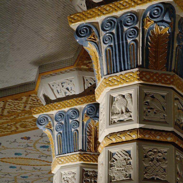 Glazed ceramic capitals with owls and stylised foliage, Café Imperial, Prague