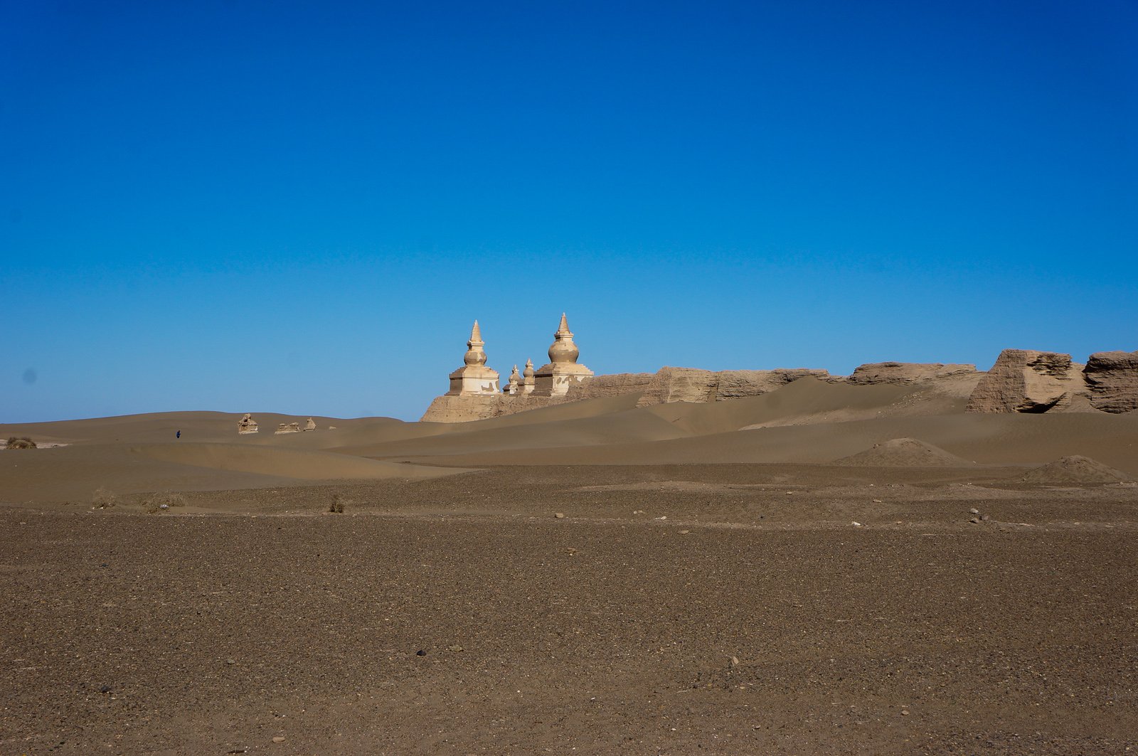 Ruins of Khara-Khoto Black City walls and pagoda rising from the Gobi Desert, Inner Mongolia