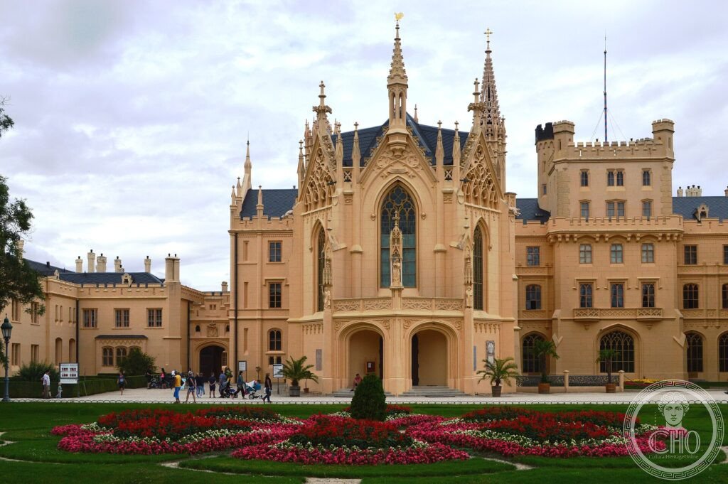 The neo-Gothic Lednice Chateau and its formal flower garden in Moravia