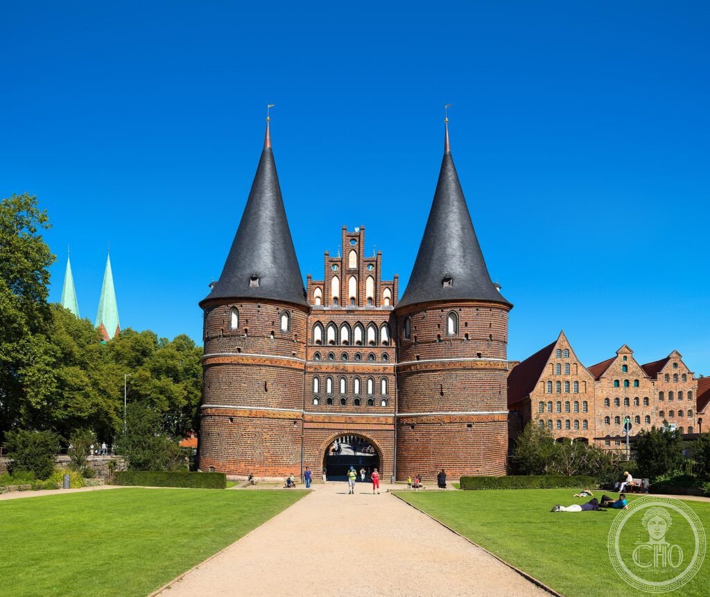 The twin round towers of the Holstentor brick gate at the entrance to Lübeck