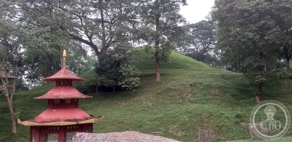 A grassy royal burial mound (moidam) of the Ahom dynasty at Charaideo, Assam