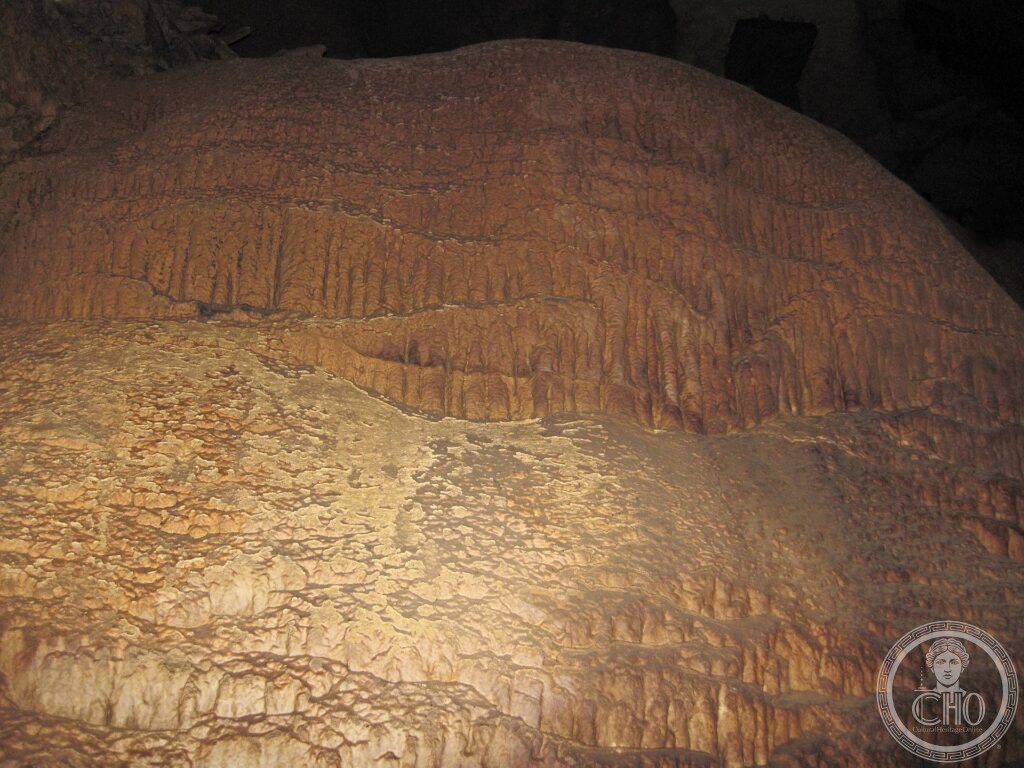 A large brown travertine flowstone formation (Frozen Niagara) in Mammoth Cave, Kentucky