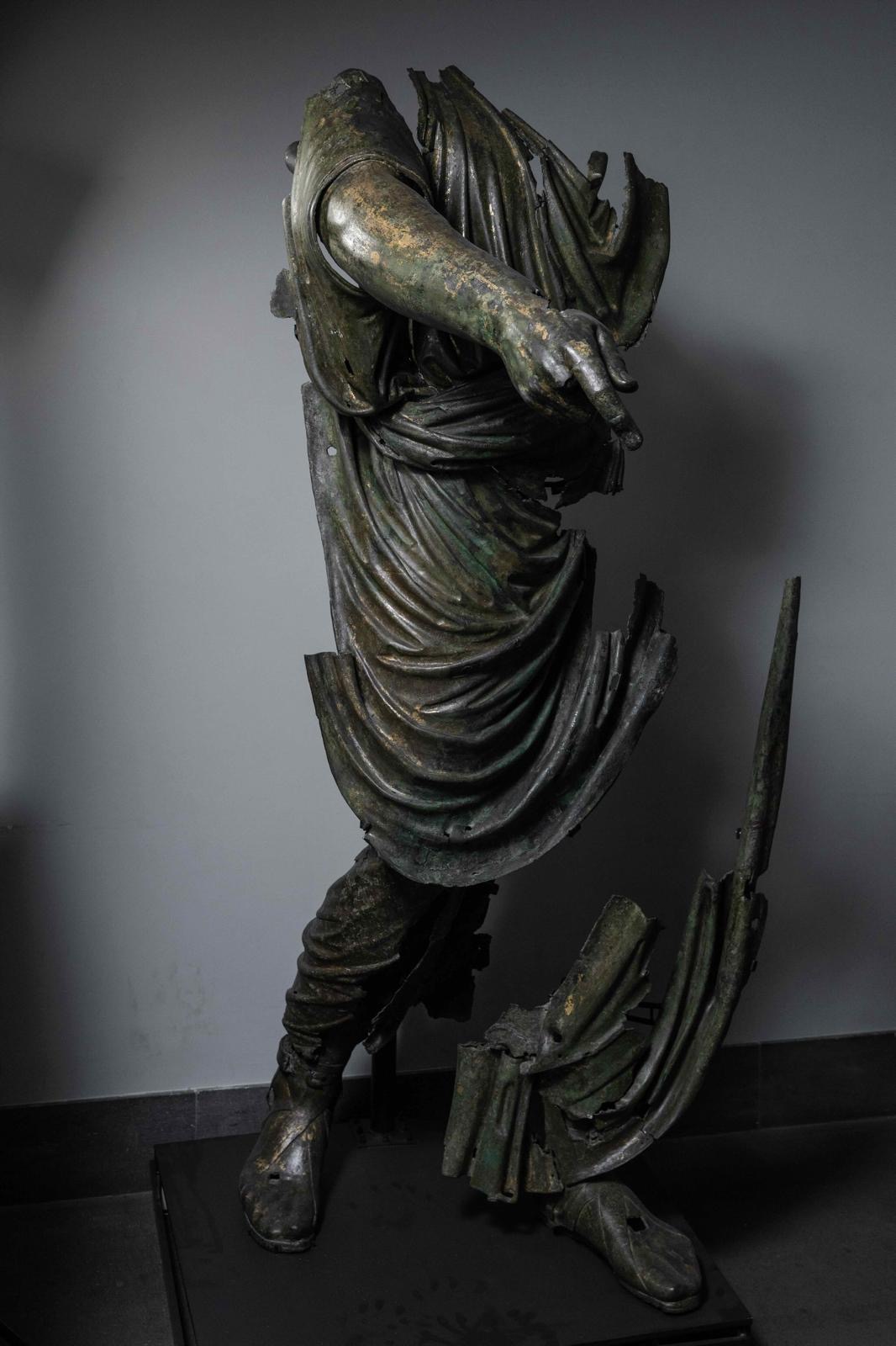 Headless gilded bronze togatus statue from the bridge of Valentinian