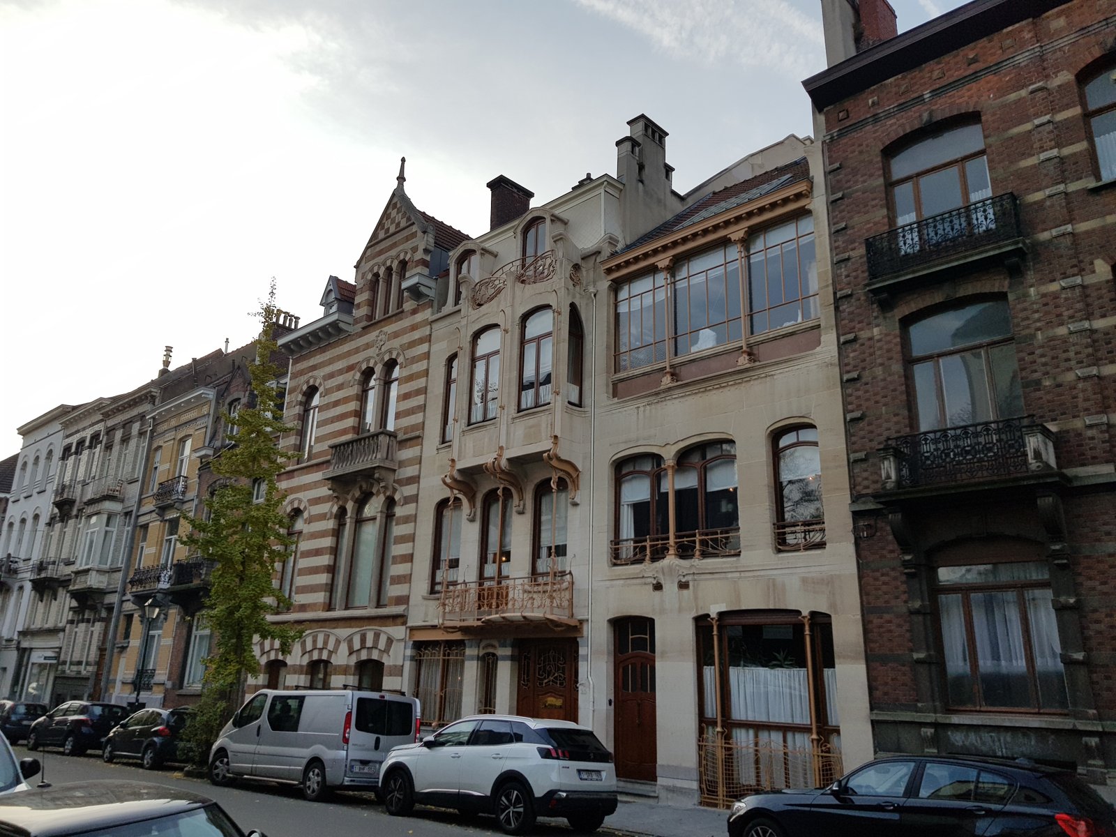 Full street facade of the Horta house and studio in Brussels