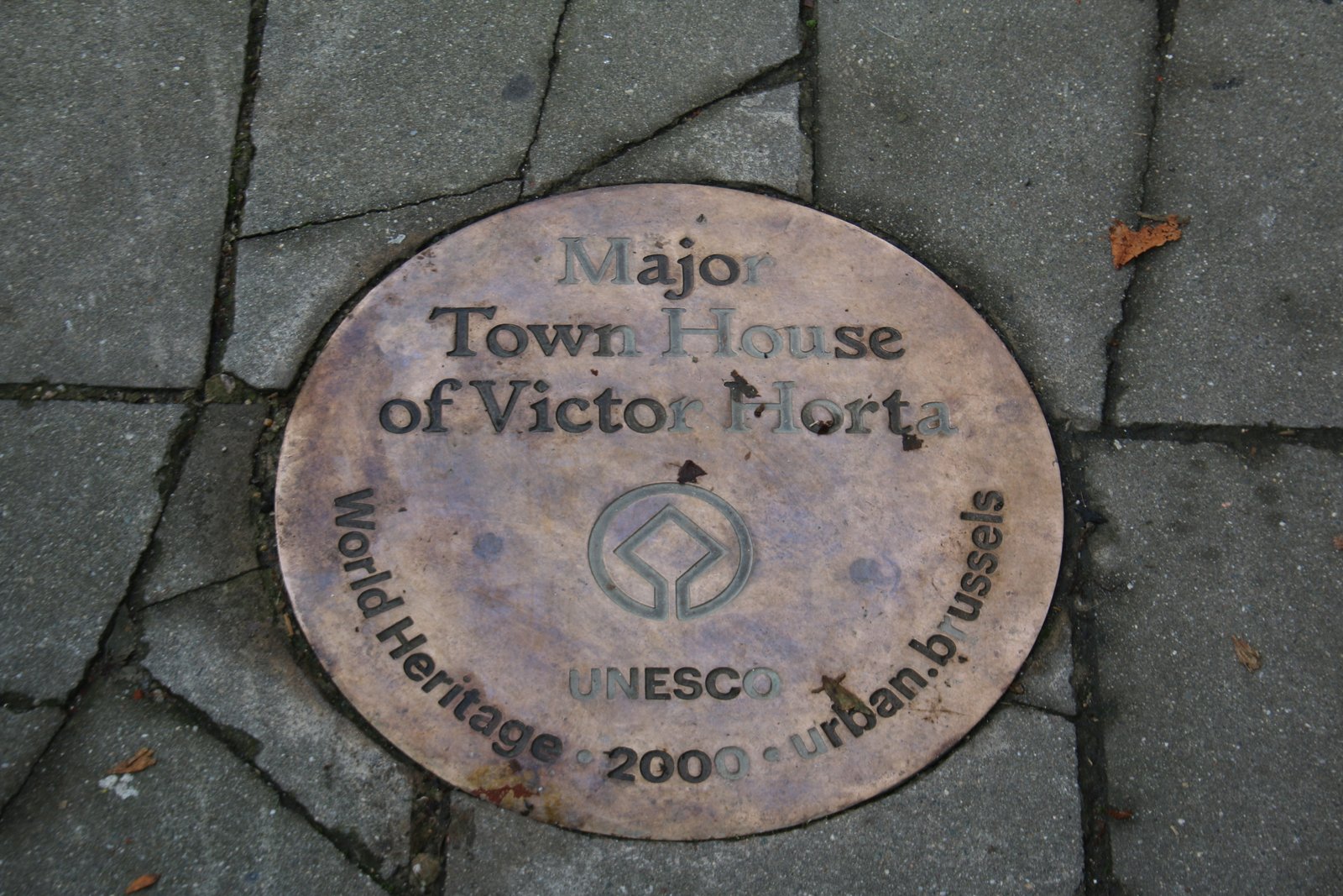 Bronze UNESCO World Heritage pavement marker for the Major Town House of Victor Horta