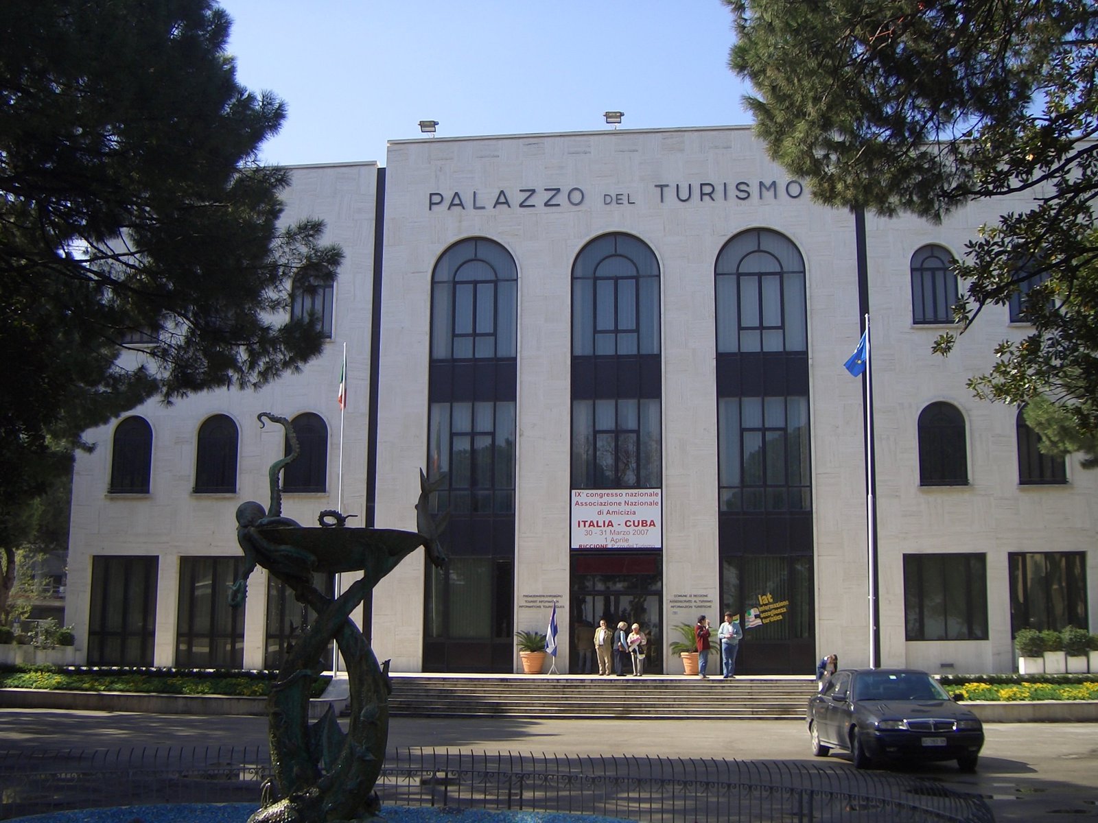 Palazzo del Turismo di Riccione, travertine-clad rationalist front on Piazzale Ceccarini.
