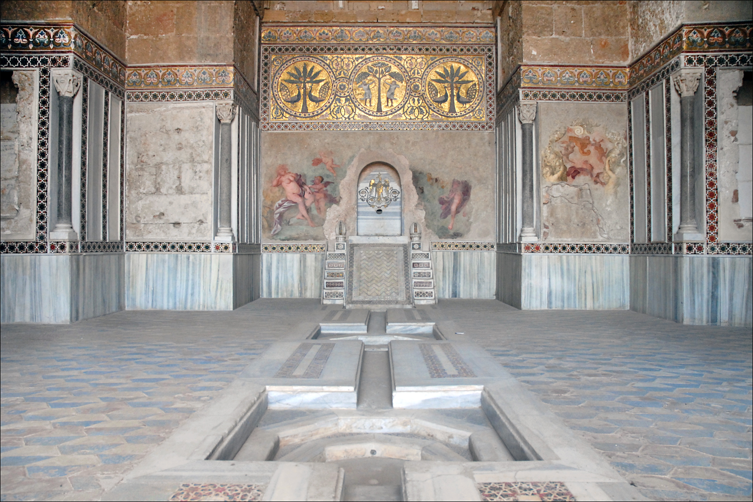The Hall of the Fountain at La Zisa, Palermo, with the golden mosaic frieze and the central fountain