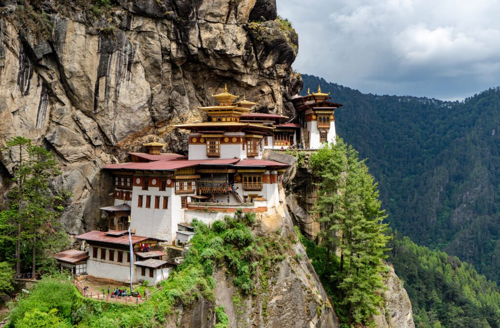 Paro Taktsang (Tiger's Nest Monastery) clinging to a vertical cliff face in the Paro Valley, Bhutan