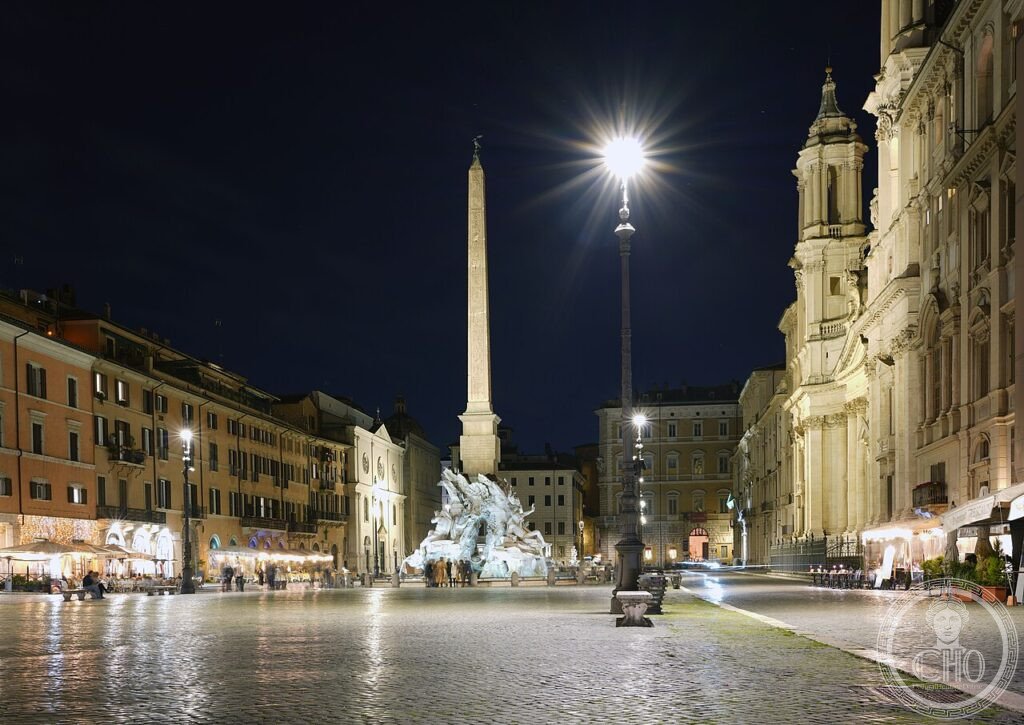 Piazza Navona Roma sera Fontana Quattro Fiumi Bernini 1651 Sant Agnese Borromini 1653 ovale barocco UNESCO 1980