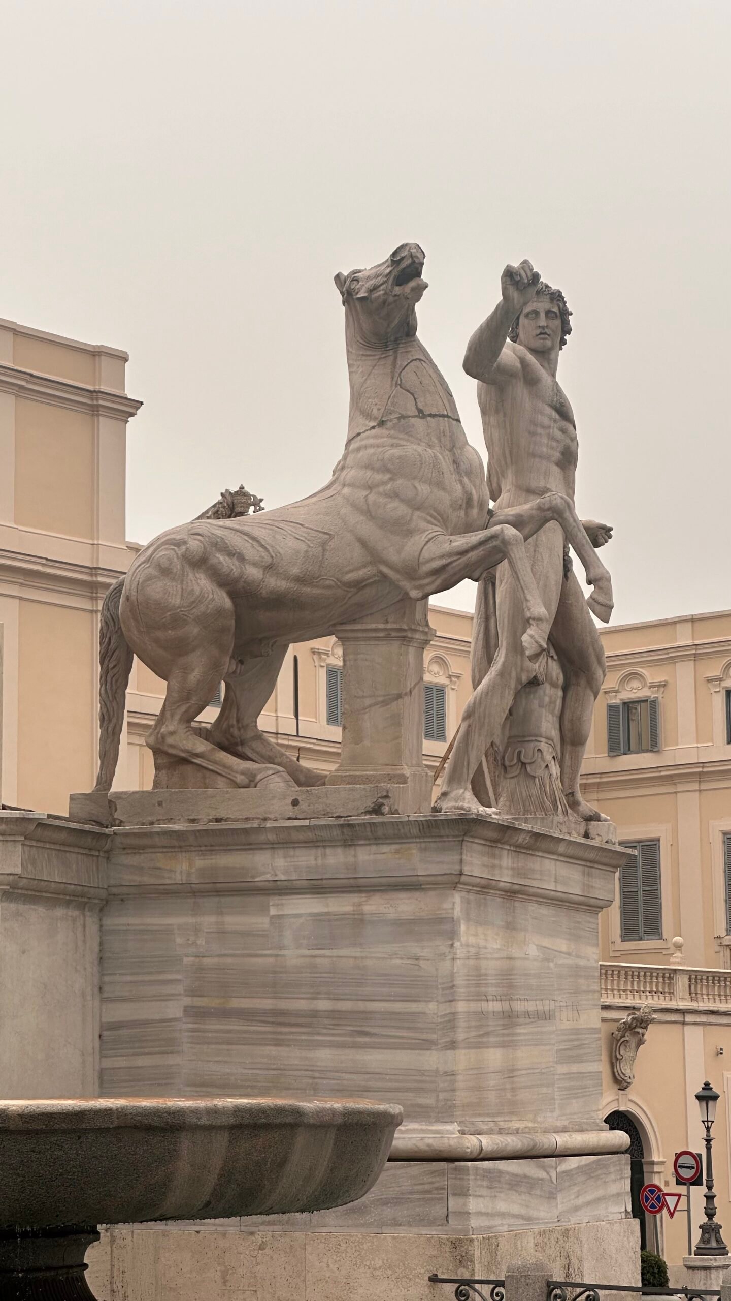 One of the colossal Dioscuri with his horse.