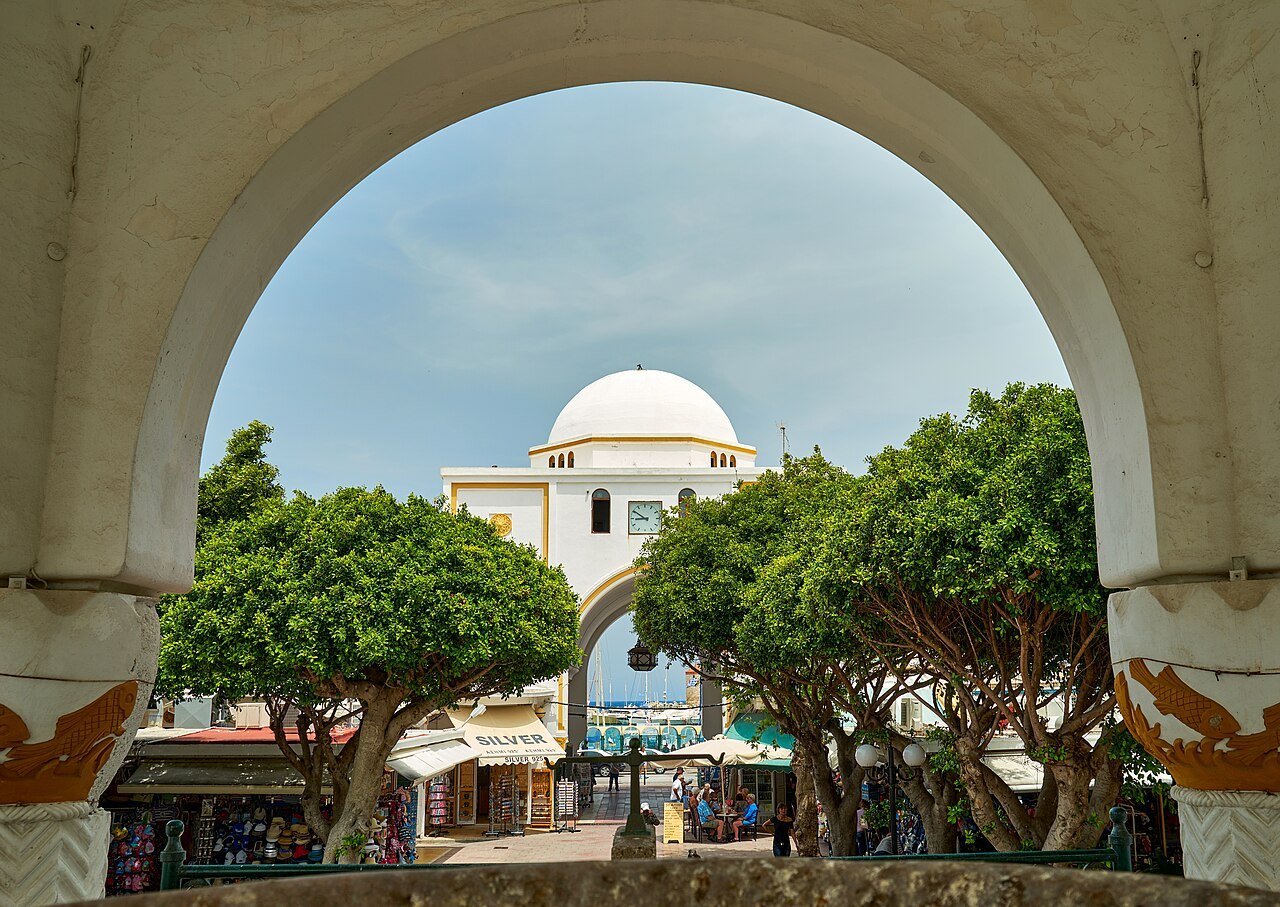 The New Market arcades and clock tower on the Mandraki waterfront in Rhodes