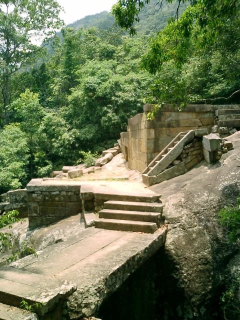 Stone ruins of the ancient Buddhist forest monastery at Ritigala, Sri Lanka
