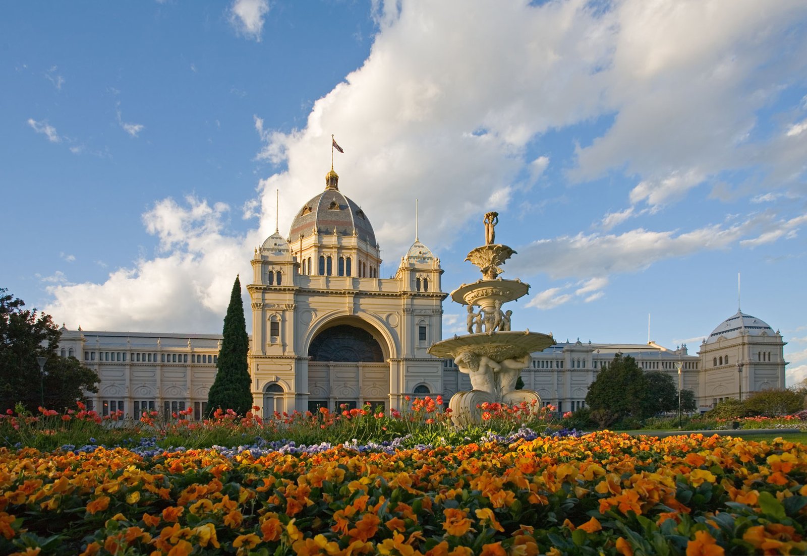 Royal Exhibition Building with tulip gardens in Carlton Gardens, Melbourne