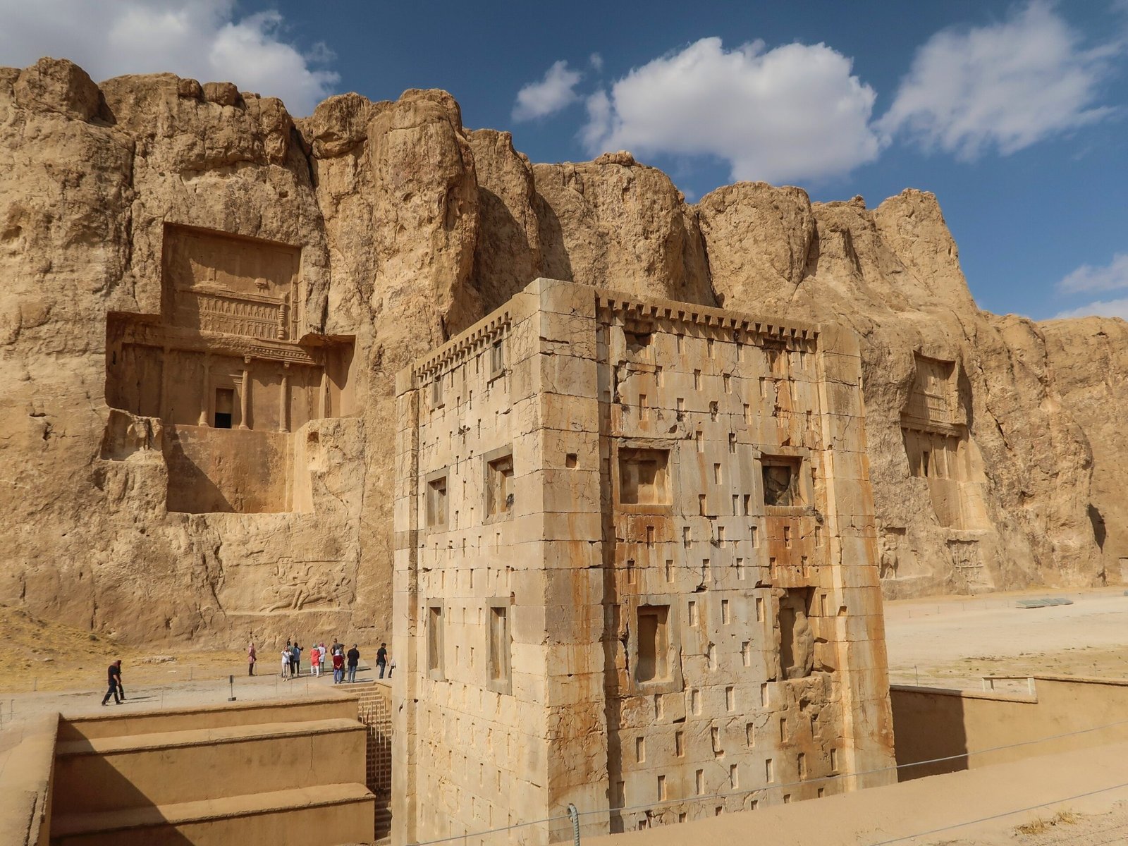 Naqsh-e Rostam cliff face with Sassanid royal investiture reliefs and Achaemenid royal tombs, Fars Province, Iran