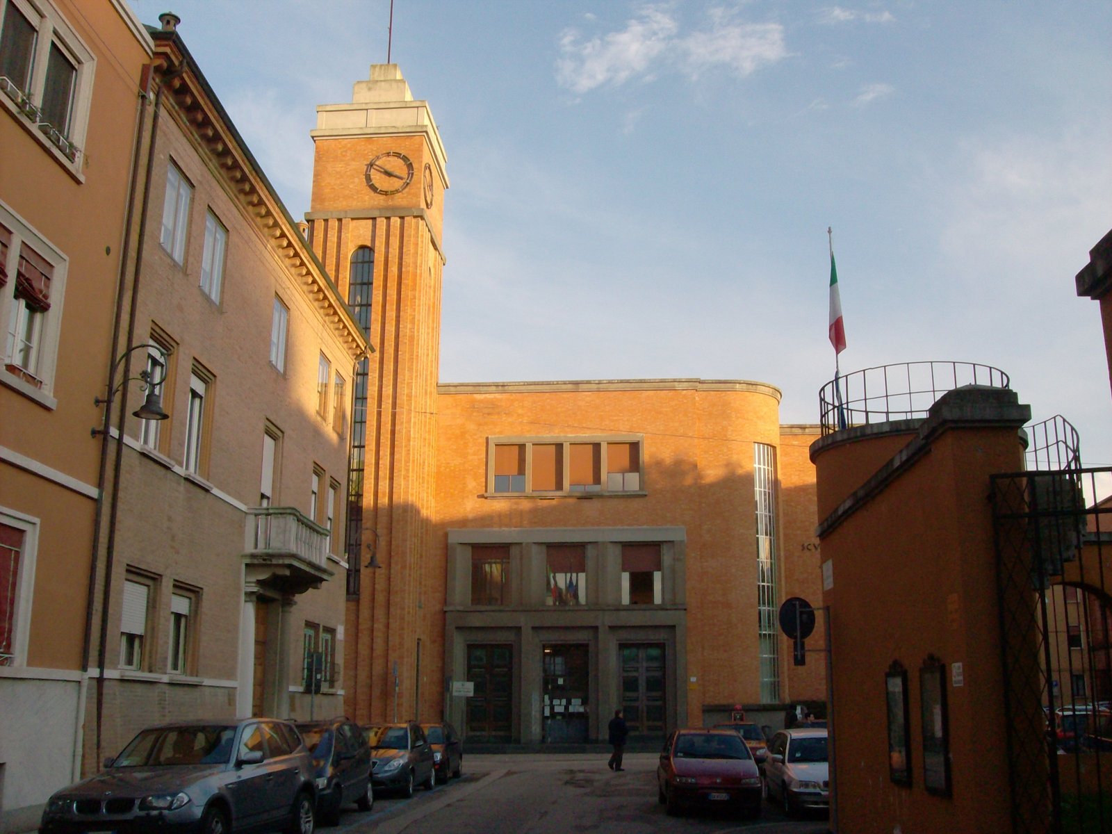 Scuola Alda Costa, Ferrara, with the brick tower rising over the cornice on Via Previati