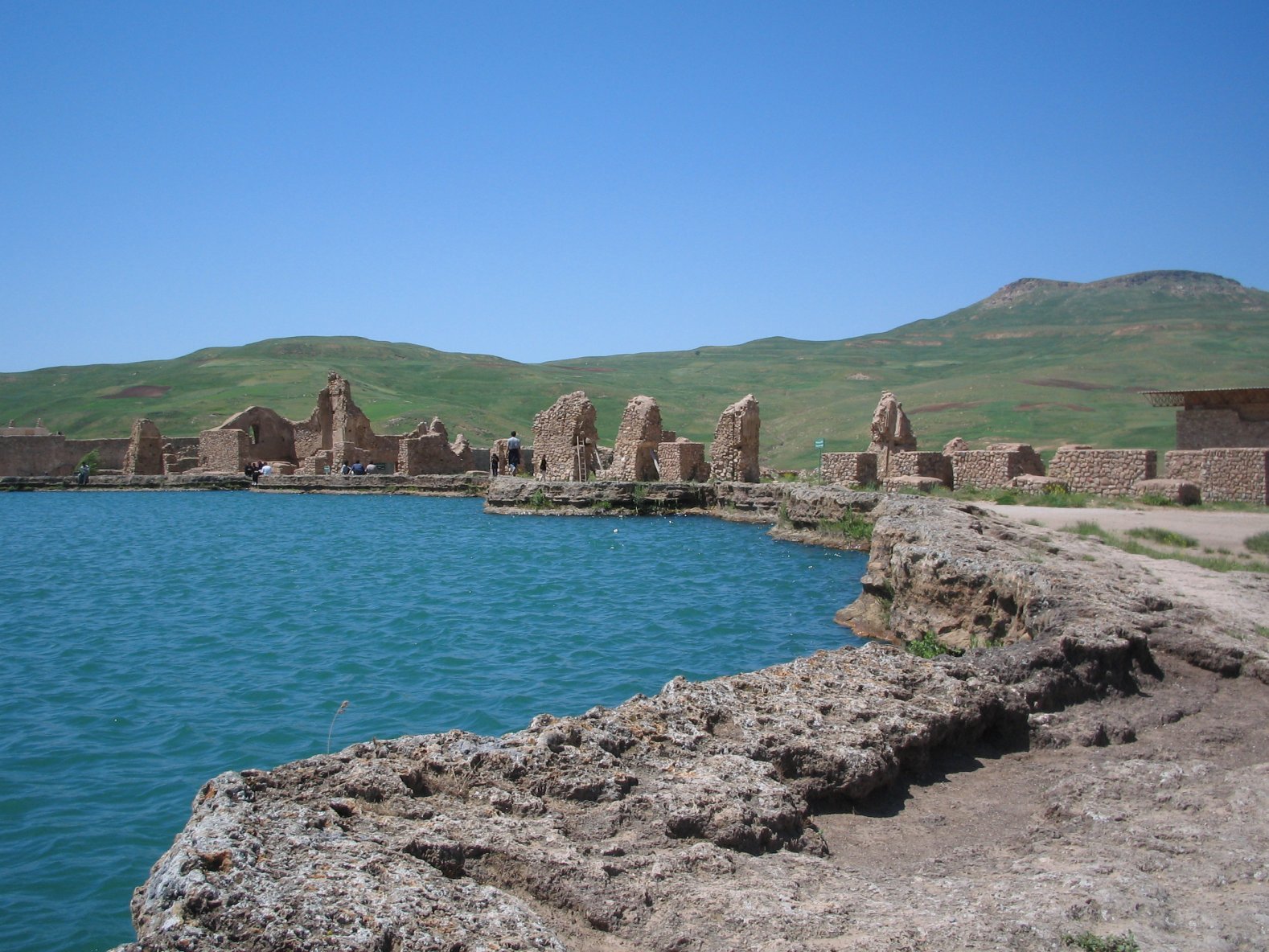 Aerial view of Takht-e Soleyman, Iran — the Zoroastrian fire sanctuary with its volcanic crater lake